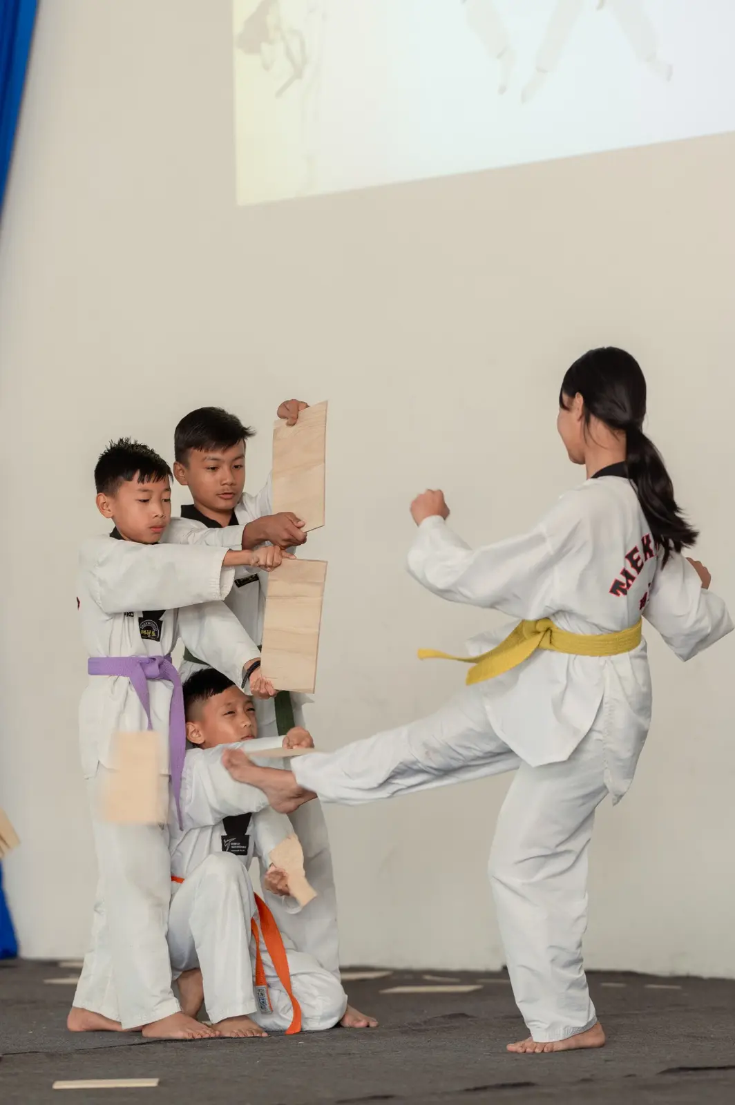Grace Academy students presenting a Taekwondo demonstration